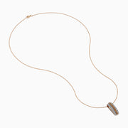 The Espresso 14K Two Tone Gold Pendant showcases brown and white diamonds in a vertical design, set on a delicate gold chain for a refined, elegant touch.