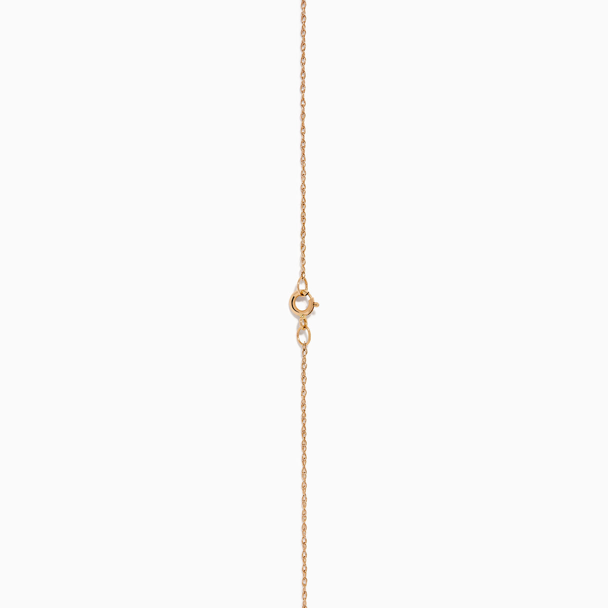 The Espresso 14K Two Tone Gold Pendant showcases brown and white diamonds in a vertical design, set on a delicate gold chain for a refined, elegant touch.