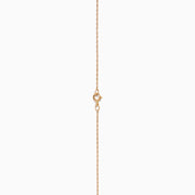 The Espresso 14K Two Tone Gold Pendant showcases brown and white diamonds in a vertical design, set on a delicate gold chain for a refined, elegant touch.