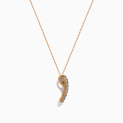 The Espresso 14K Two Tone Gold Pendant showcases brown and white diamonds in a vertical design, set on a delicate gold chain for a refined, elegant touch.