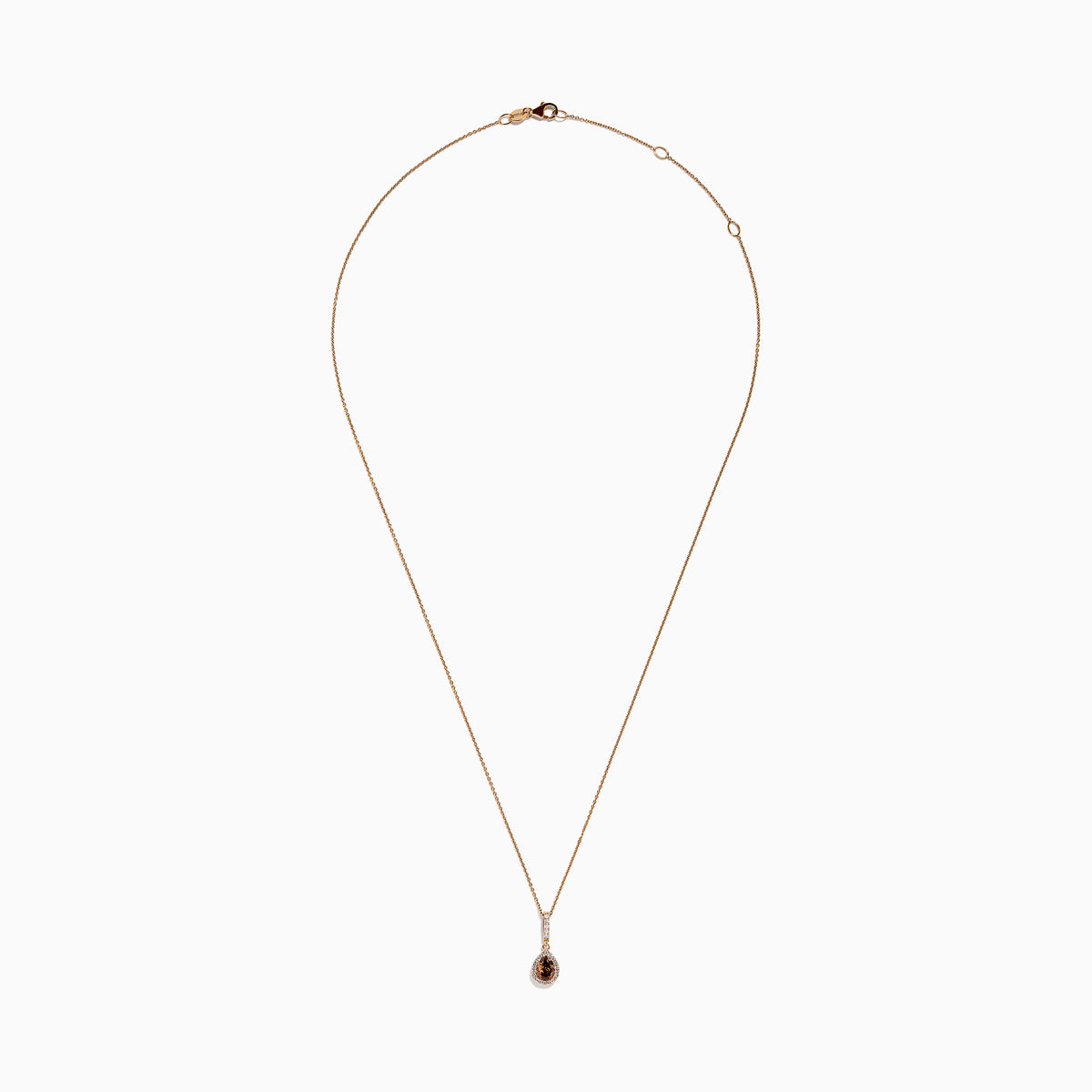 The 14K Rose Gold Pear Halo Brown and White Diamond Pendant features a teardrop-shaped brown and white diamond centerpiece, bordered with sparkling clear stones and accented by a vertical row of clear stones above.