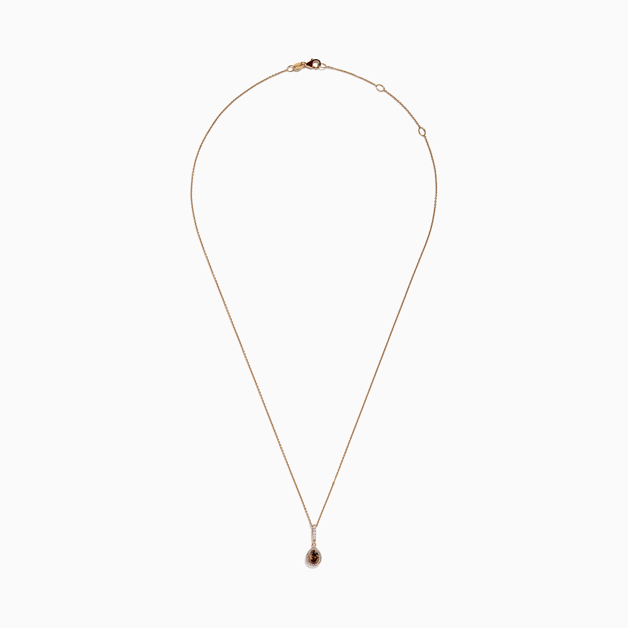 The 14K Rose Gold Pear Halo Brown and White Diamond Pendant features a teardrop-shaped brown and white diamond centerpiece, bordered with sparkling clear stones and accented by a vertical row of clear stones above.