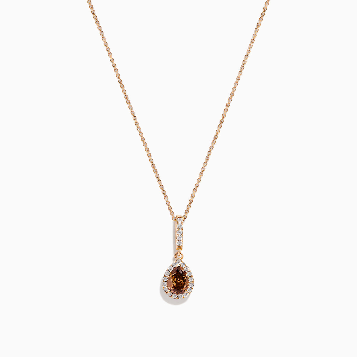 The 14K Rose Gold Pear Halo Brown and White Diamond Pendant features a teardrop-shaped brown and white diamond centerpiece, bordered with sparkling clear stones and accented by a vertical row of clear stones above.