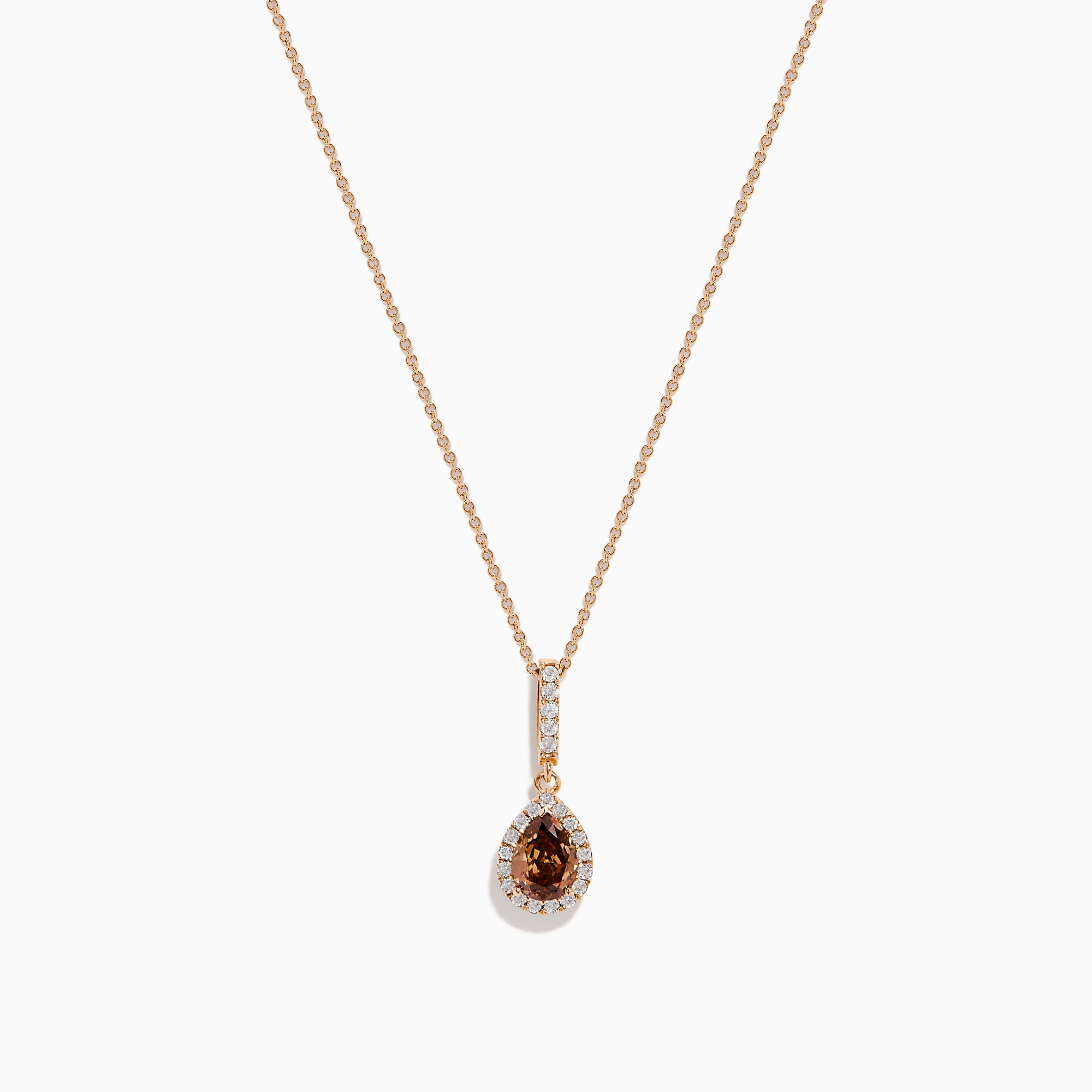 The 14K Rose Gold Pear Halo Brown and White Diamond Pendant features a teardrop-shaped brown and white diamond centerpiece, bordered with sparkling clear stones and accented by a vertical row of clear stones above.