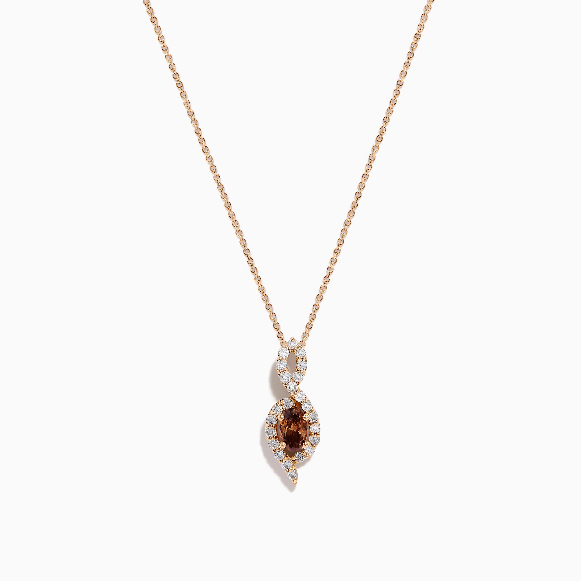The 14K Rose Gold Brown and White Diamond Pendant features a marquise-shaped brown gemstone at its center, highlighted by a twisting design set with sparkling brown and white diamonds.