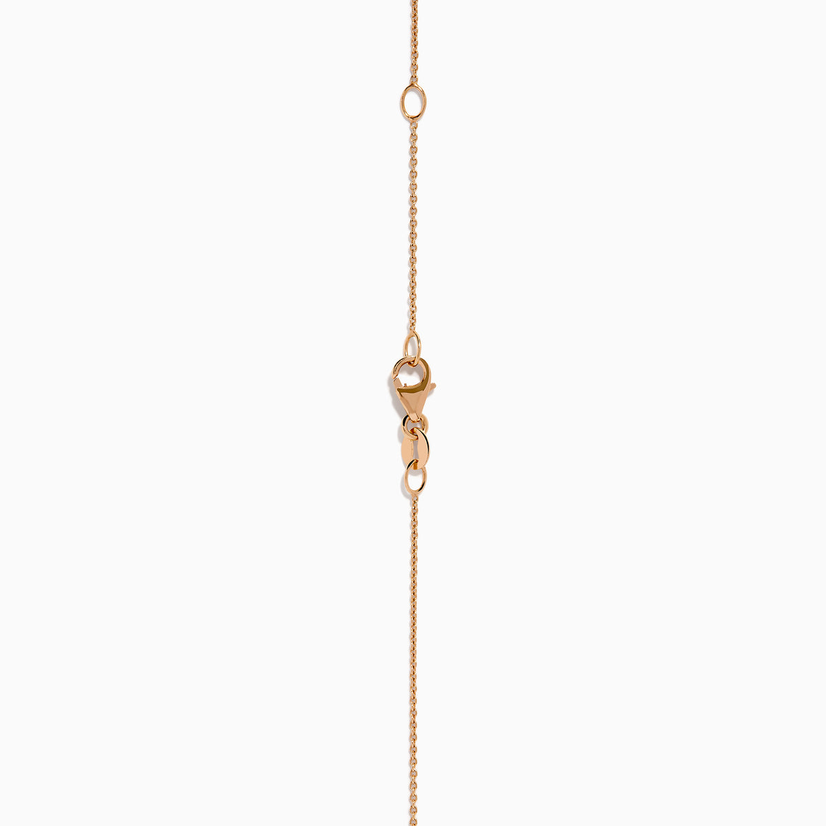 The 14K Rose Gold Brown and White Diamond Pendant features a marquise-shaped brown gemstone at its center, highlighted by a twisting design set with sparkling brown and white diamonds.