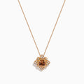 The 14K Rose Gold Brown and White Diamond Pendant features a flower-shaped design with a central brown and white diamond, accented by clear stones, shown on a white background.