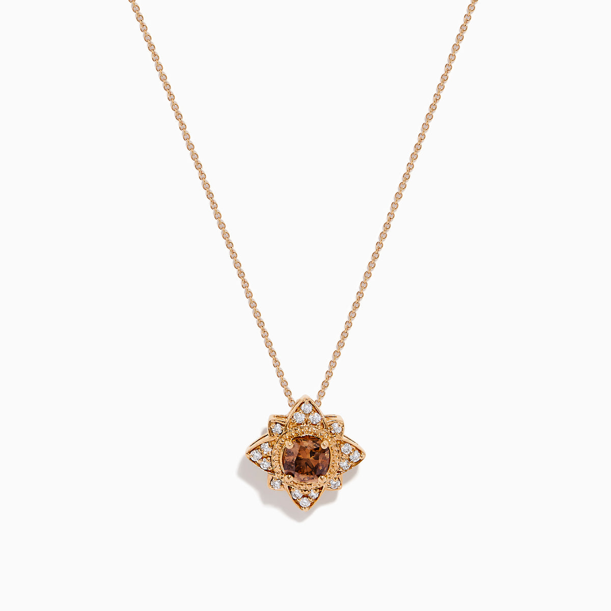 The 14K Rose Gold Brown and White Diamond Pendant features a flower-shaped design with a central brown and white diamond, accented by clear stones, shown on a white background.