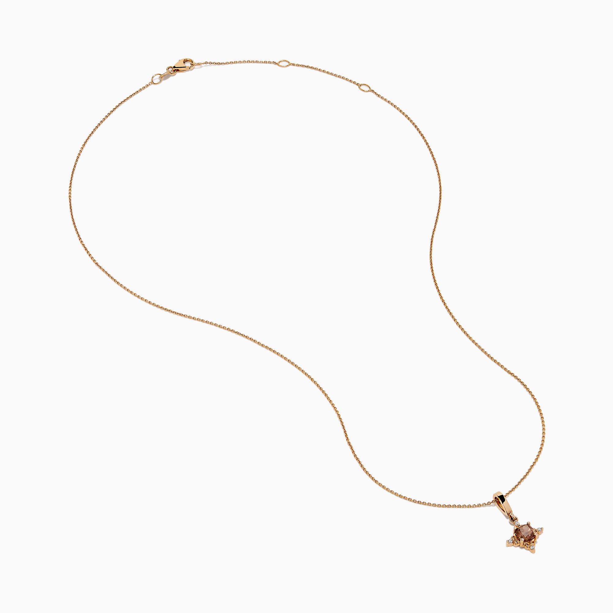 A 14K rose gold chain necklace featuring a pendant with brown and white diamonds.