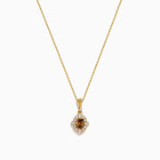 The 14K Yellow Gold Brown and White Diamond Pendant features a delicate gold chain with a central brown diamond, accented by smaller white diamonds in a floral-inspired design.