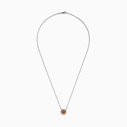 The Espresso 18K Two-Tone Gold Brown and White Diamond Necklace, featuring a round brown diamond surrounded by a halo of white diamonds, is elegantly displayed on a white background.