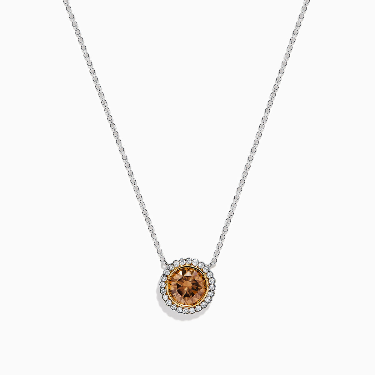 The Espresso 18K Two-Tone Gold Brown and White Diamond Necklace, featuring a round brown diamond surrounded by a halo of white diamonds, is elegantly displayed on a white background.