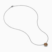 The Espresso 18K Two-Tone Gold Brown and White Diamond Necklace, featuring a round brown diamond surrounded by a halo of white diamonds, is elegantly displayed on a white background.