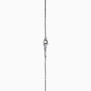 The Espresso 18K Two-Tone Gold Brown and White Diamond Necklace, featuring a round brown diamond surrounded by a halo of white diamonds, is elegantly displayed on a white background.
