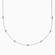 The Pave Classica 14K White Gold Diamond Bezel Station Necklace and Bracelet Set features small, evenly spaced round diamond accents, beautifully displayed on a plain white background.
