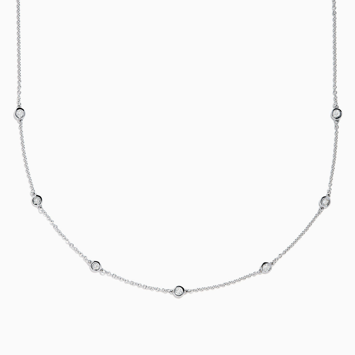 The Pave Classica 14K White Gold Diamond Bezel Station Necklace and Bracelet Set features small, evenly spaced round diamond accents, beautifully displayed on a plain white background.