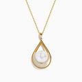 The 14K Yellow Gold Fresh Water Pearl and Diamond Drop Pendant features a teardrop design with a central freshwater pearl, accented by sparkling diamonds in a yellow gold setting.