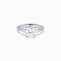 The Star Lab Grown Diamond Ring in 18K White Gold showcases a large round-cut lab diamond center with smaller diamonds along the band, beautifully displayed on a white background.