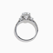 The Star Lab Grown Diamond Ring in 18K White Gold showcases a large round-cut lab diamond center with smaller diamonds along the band, beautifully displayed on a white background.