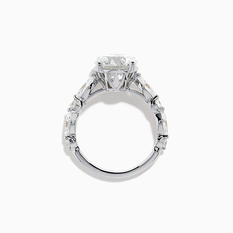 The Star Lab Grown Diamond Ring in 18K White Gold features a large oval lab diamond center with two round diamonds on each side, beautifully set and displayed on a white background.