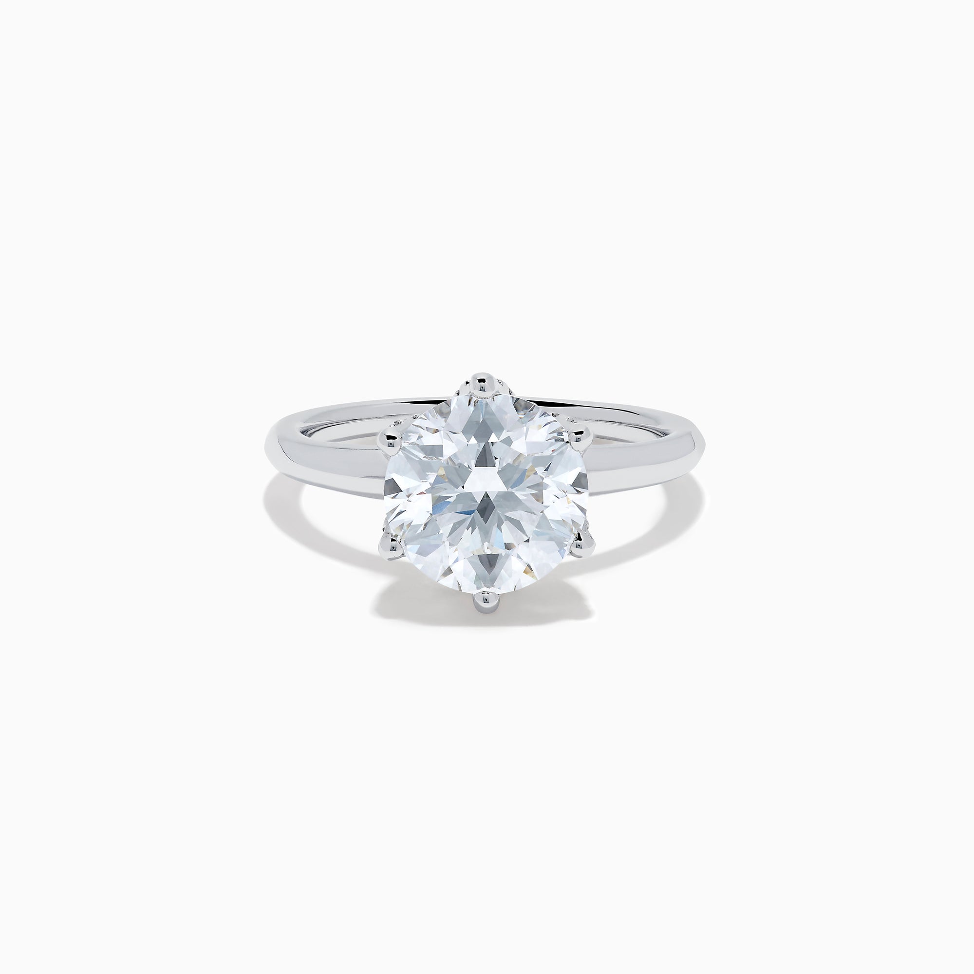 The Star Lab Grown Diamond Ring in 18K White Gold showcases a round, brilliant-cut lab diamond in a classic six-prong setting, displayed on a white background.