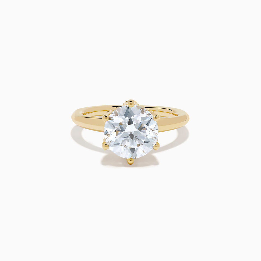 The Star Lab Grown Diamond Ring in 18K Yellow Gold features a large, oval lab diamond in an elegant prong setting, shown against a plain white background.