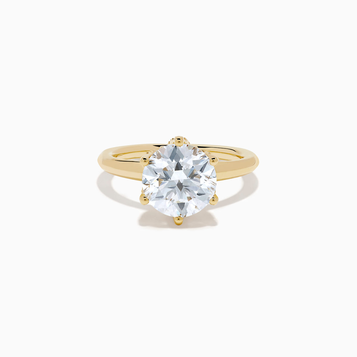 The Star Lab Grown Diamond Ring in 18K Yellow Gold features a large, oval lab diamond in an elegant prong setting, shown against a plain white background.