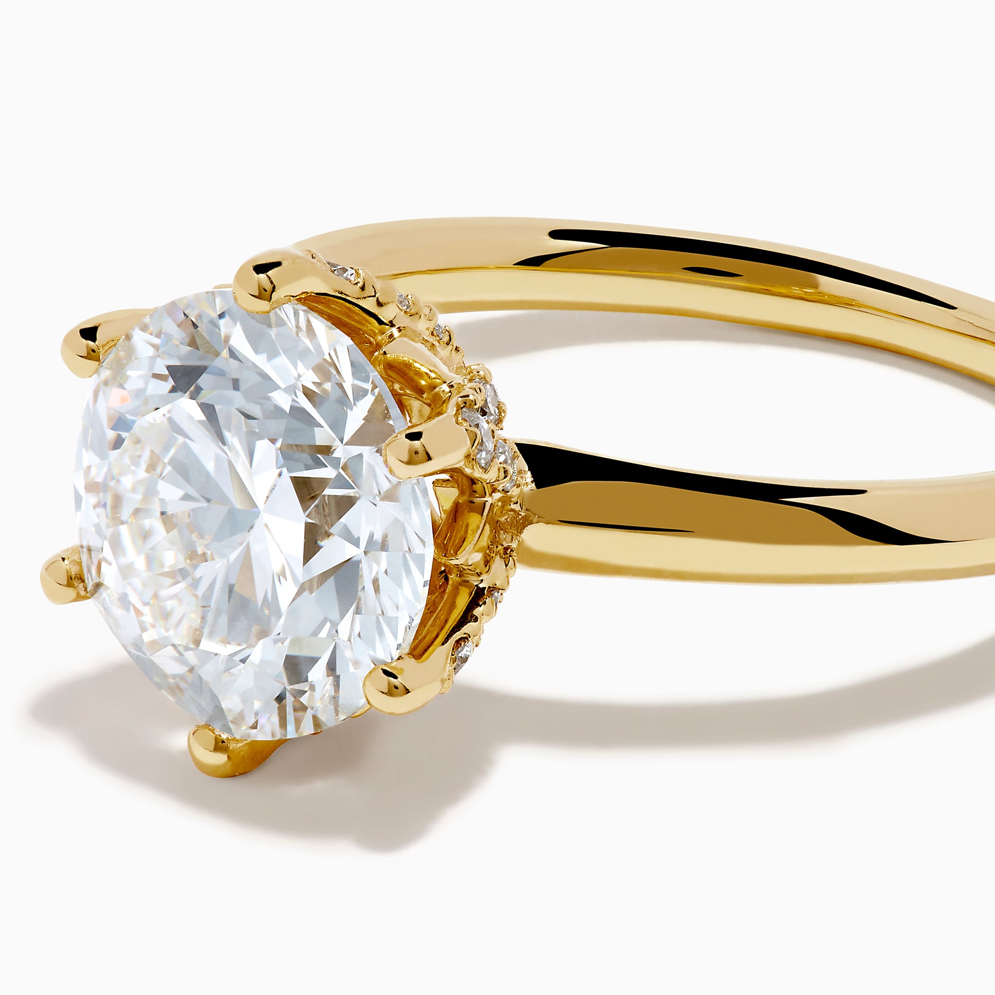 The Star Lab Grown Diamond Ring in 18K Yellow Gold features a large, oval lab diamond in an elegant prong setting, shown against a plain white background.