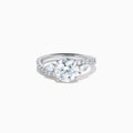 The Star Lab Grown Diamond Vine Ring in 18K White Gold features a large round lab-grown diamond center, accented with smaller diamonds along the band and an elegant vine twist design—an exquisite statement piece.
