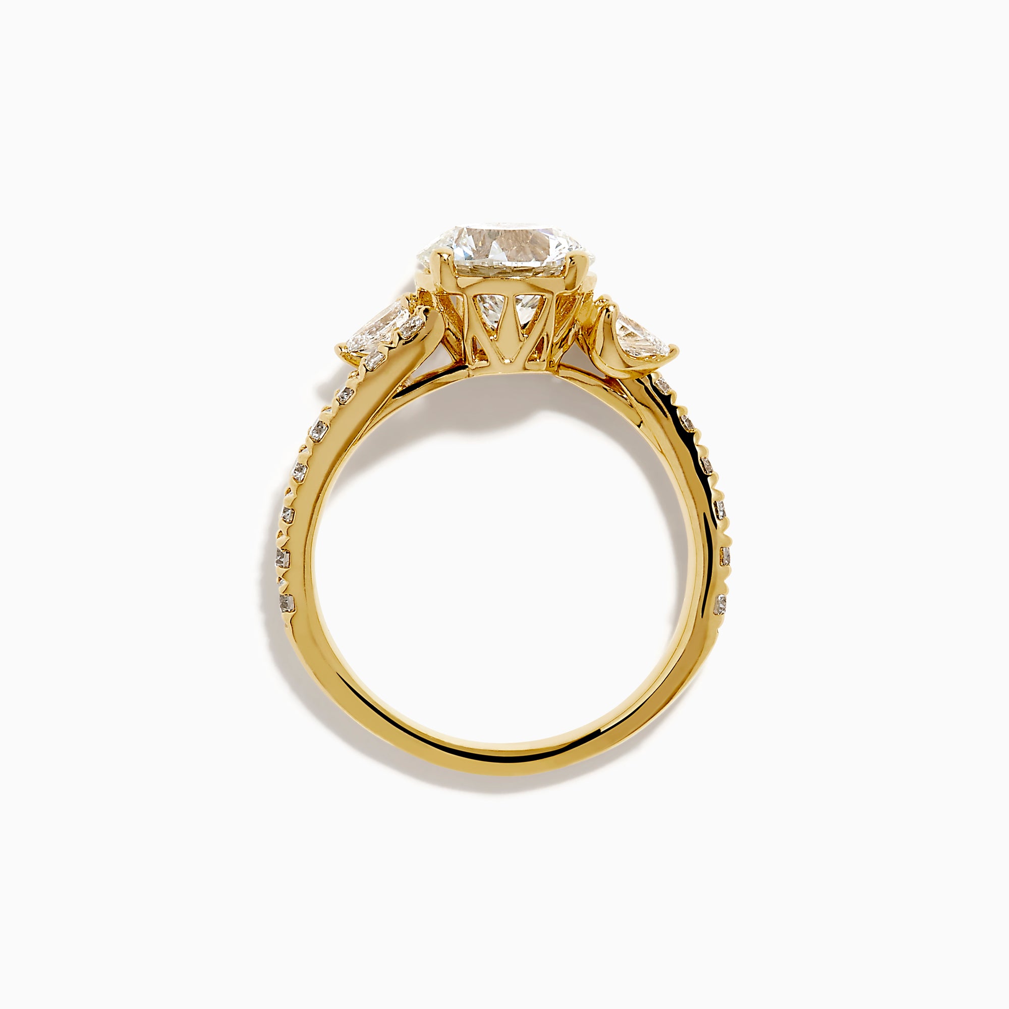 The Star Lab Grown Diamond Vine Ring in 18K Yellow Gold features a large round lab diamond and smaller diamonds along a split shank, beautifully displayed against a white background.