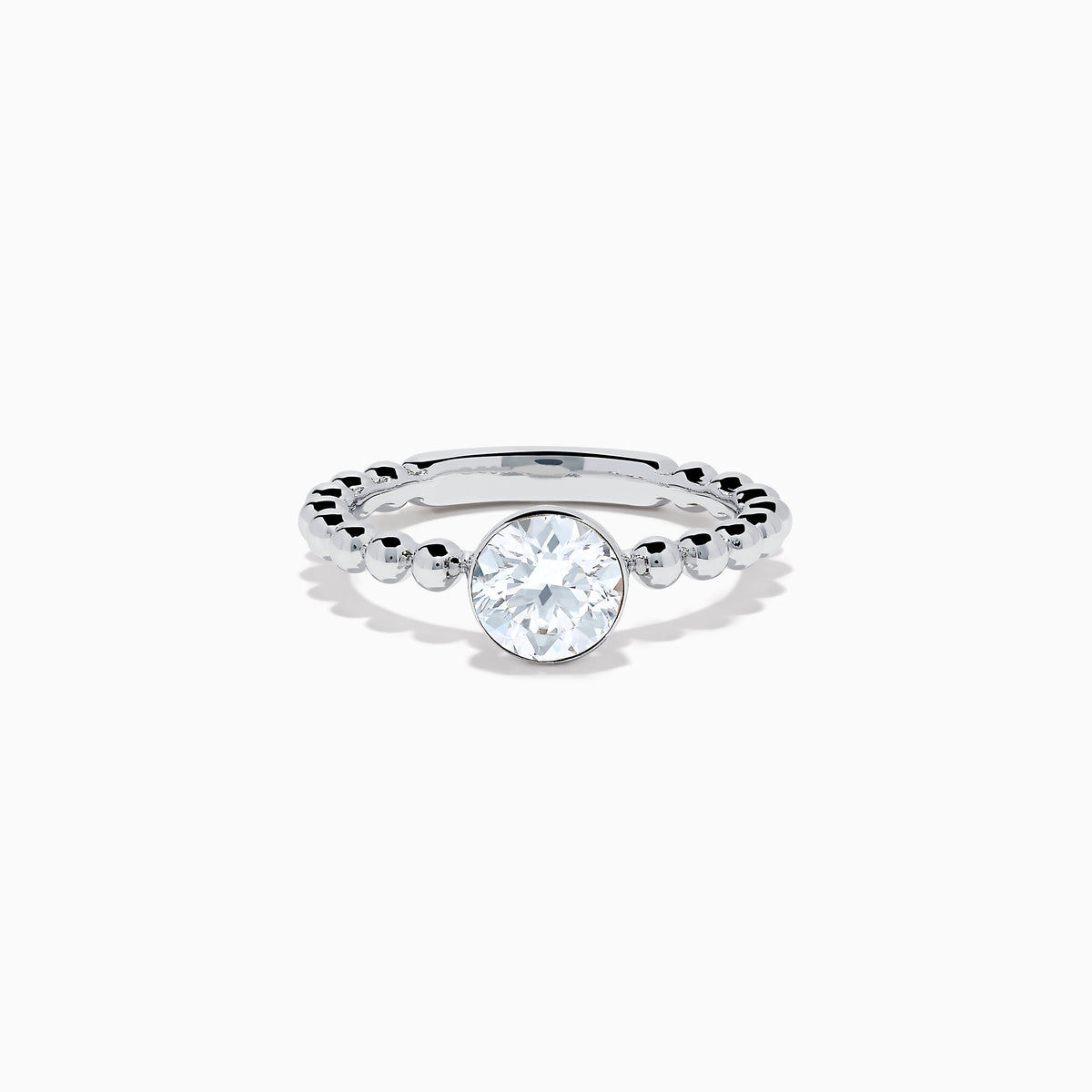 The Star Lab Grown Diamond Solitaire Beaded Ring in 18K White Gold features a round lab diamond center accented by polished beaded details along the band, shown on a white background.
