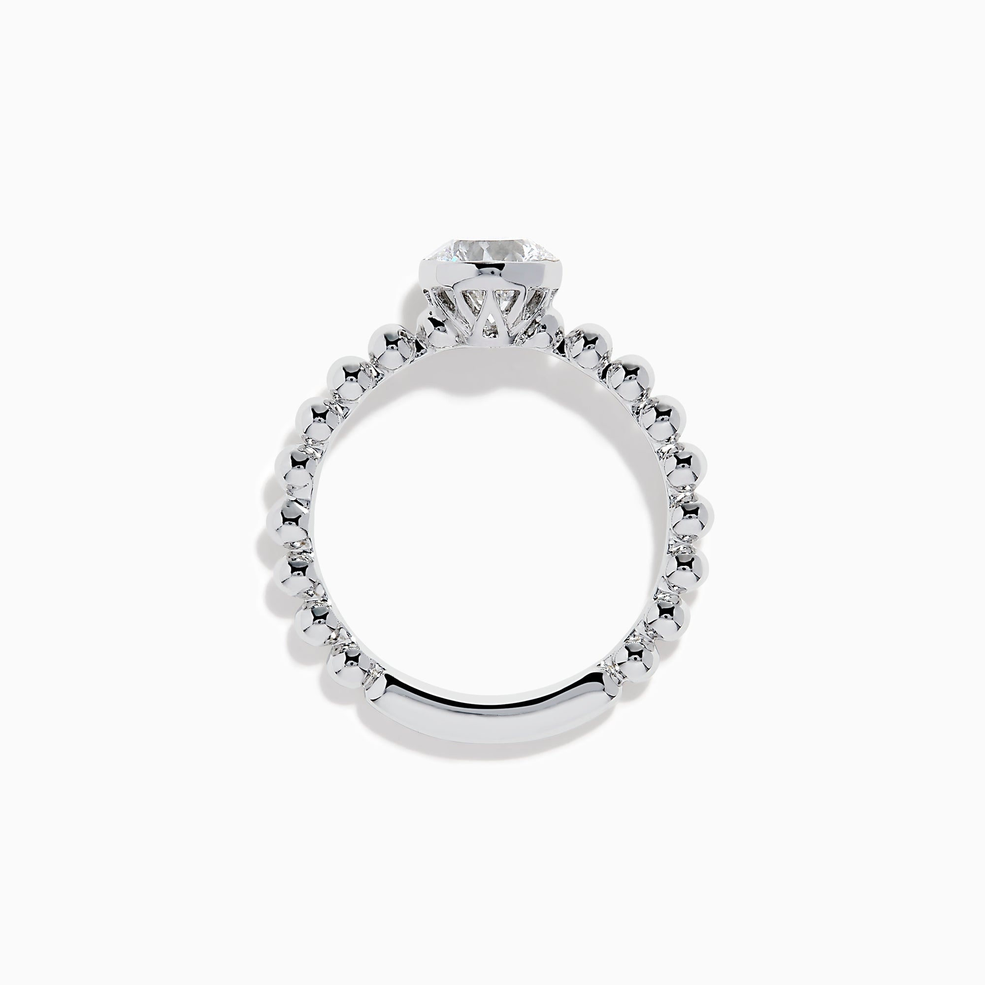 The Star Lab Grown Diamond Solitaire Beaded Ring in 18K White Gold features a round lab diamond center accented by polished beaded details along the band, shown on a white background.
