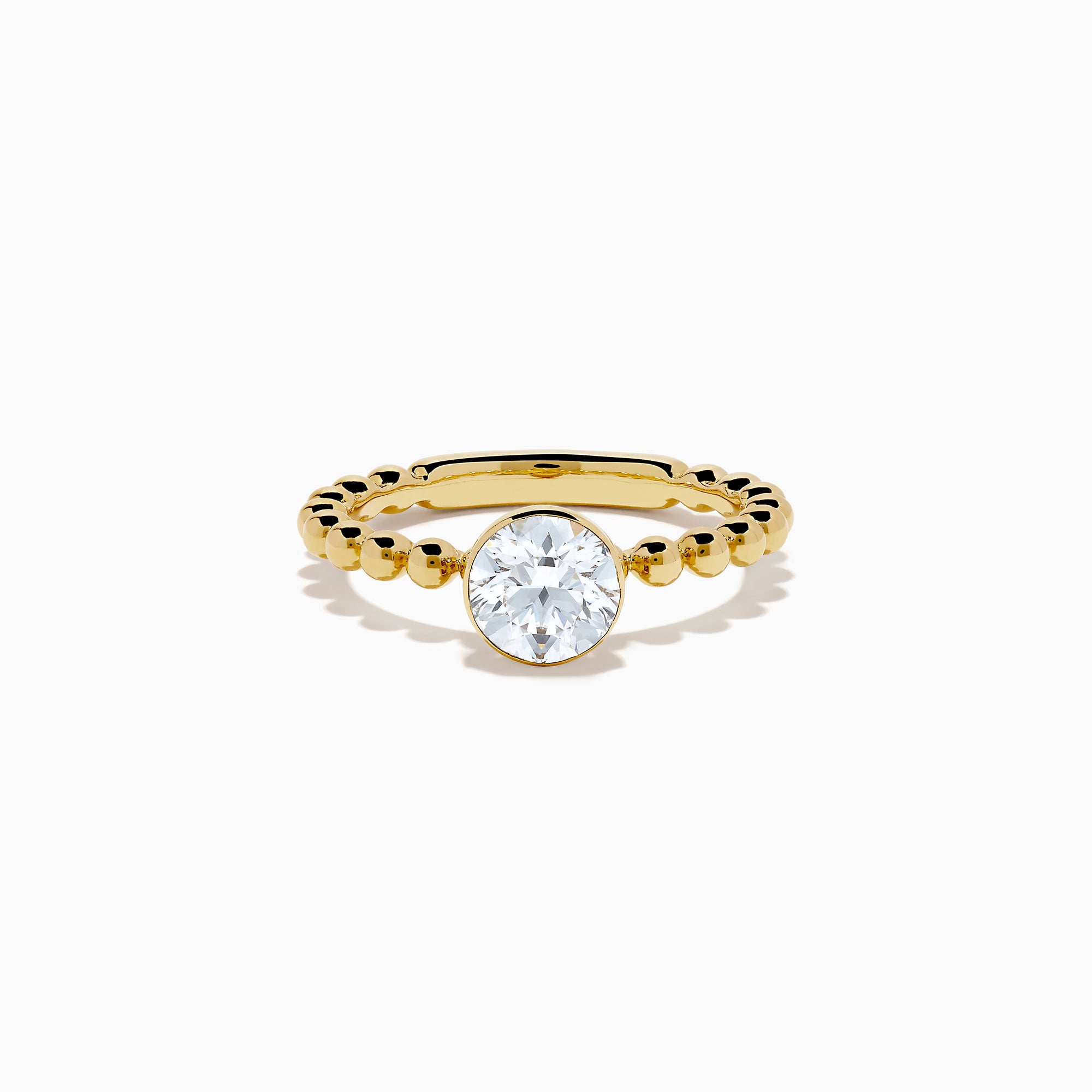 The Star Lab Grown Diamond Moderne Ring in 18K yellow gold features a beaded band and a large round lab diamond at its center, displayed on a white background.