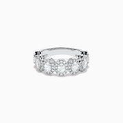 The 18K White Gold Diamond Oval Halo Band Ring showcases large oval-cut diamonds, each surrounded by a sparkling halo of smaller stones, elegantly displayed on a white background.