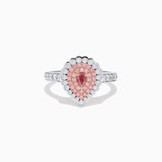 The 18K Two Tone Gold Pink and White Diamond Ring features a teardrop-shaped pink diamond cluster encircled by white diamonds, set on a two-tone gold band adorned with additional diamonds.