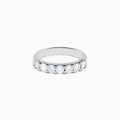 The 14K White Gold 7-Stone Prong Set Diamond Band, 1.00 TCW, features seven round diamonds set closely together along the top half of the band.