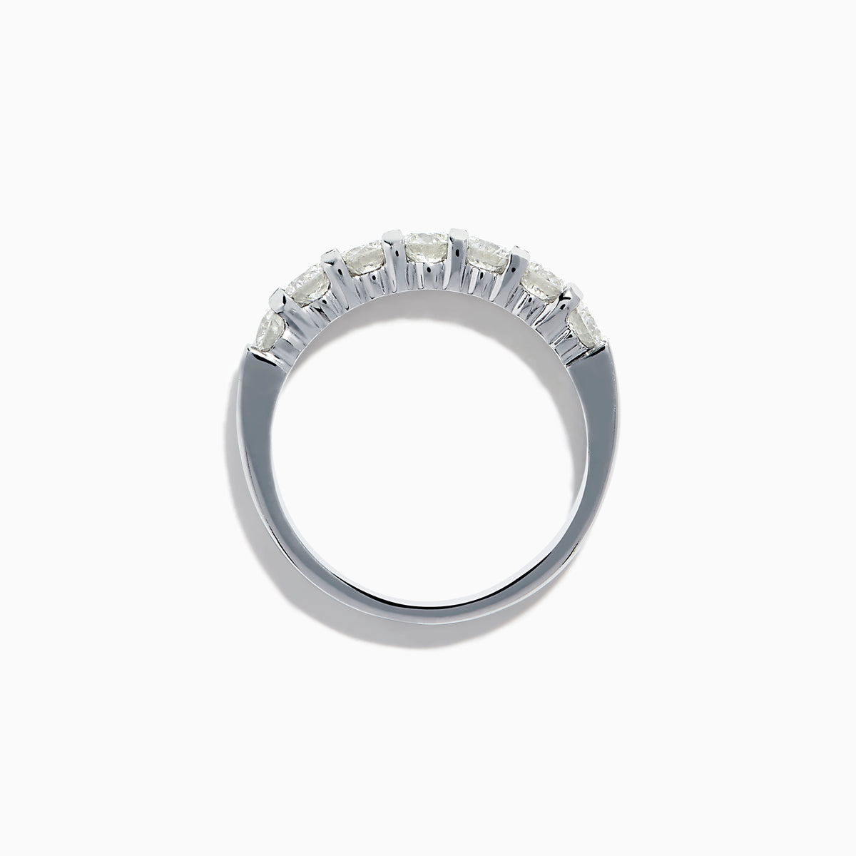 The 14K White Gold 7-Stone Prong Set Diamond Band, 1.00 TCW, features seven round diamonds set closely together along the top half of the band.