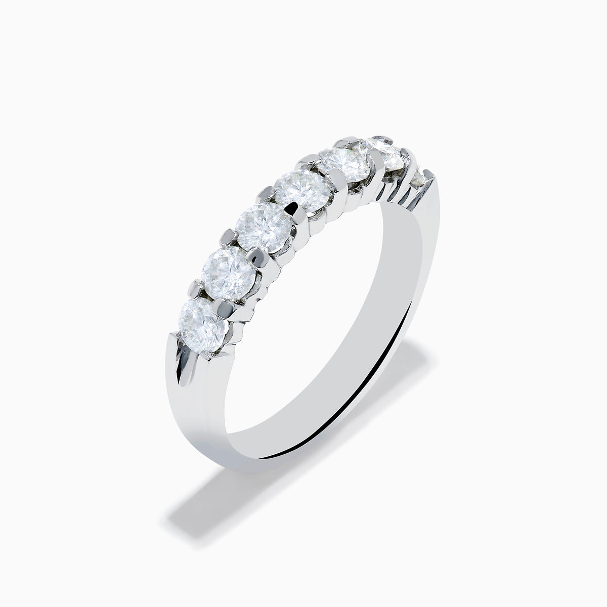 The 14K White Gold 7-Stone Prong Set Diamond Band, 1.00 TCW, features seven round diamonds set closely together along the top half of the band.