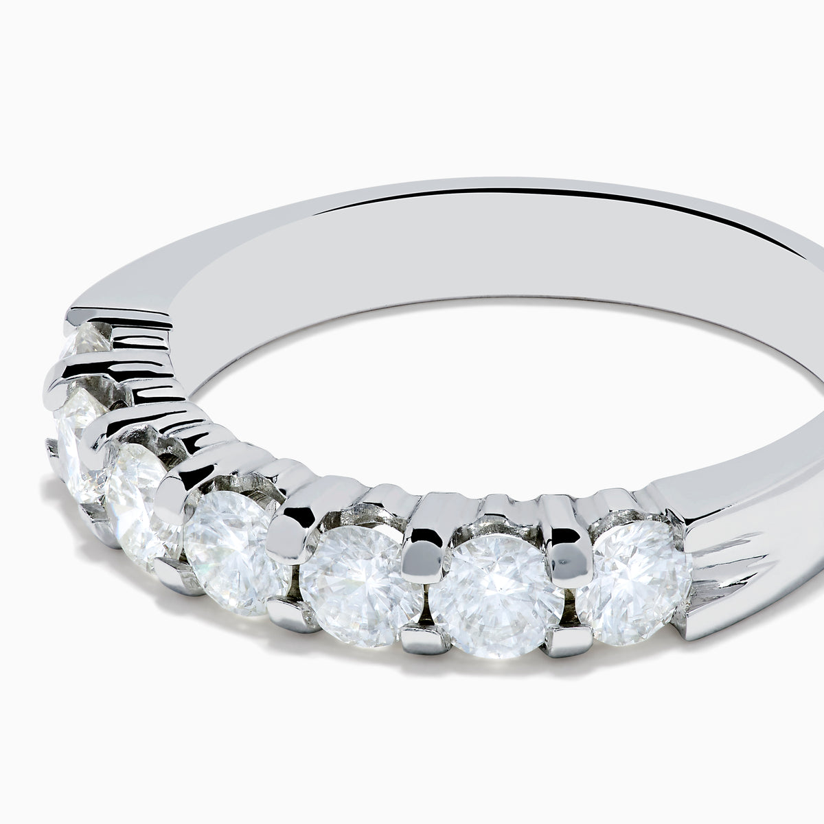 The 14K White Gold 7-Stone Prong Set Diamond Band, 1.00 TCW, features seven round diamonds set closely together along the top half of the band.