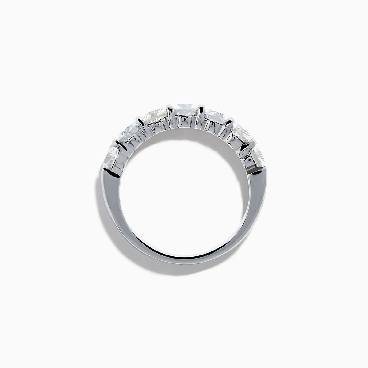 The 14K White Gold 7-Stone Prong Set Diamond Band, 1.50 TCW, features seven round diamonds set in a row and is shown on a plain white background.