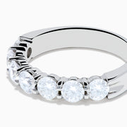 The 14K White Gold 7-Stone Prong Set Diamond Band, 1.50 TCW, features seven round diamonds set in a row and is shown on a plain white background.