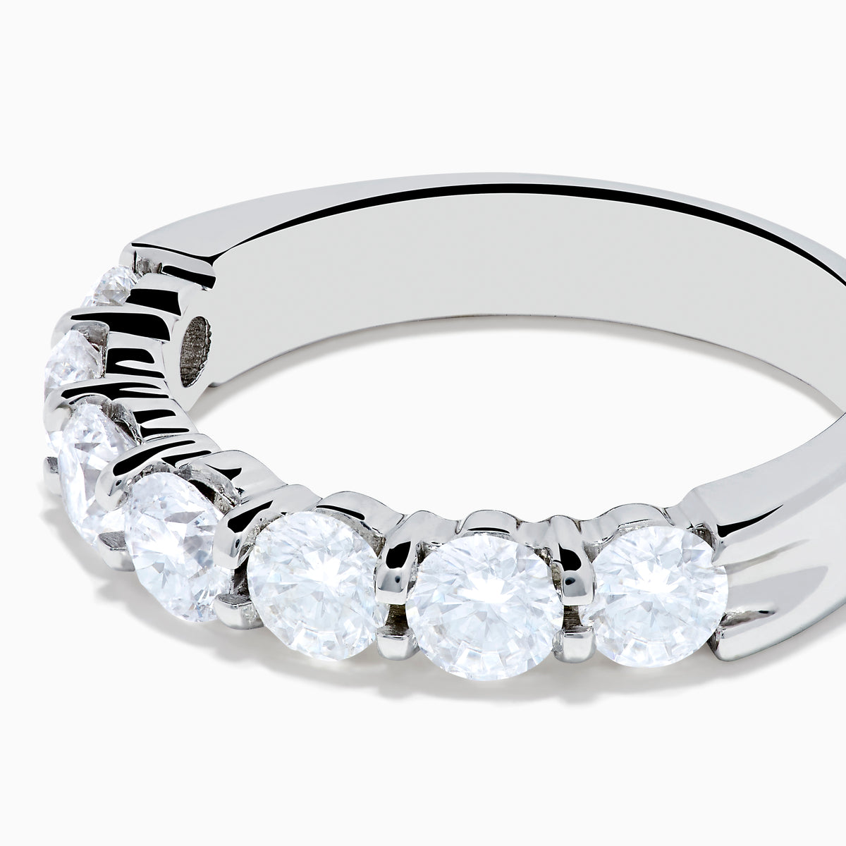 The 14K White Gold 7-Stone Prong Set Diamond Band, 1.50 TCW, features seven round diamonds set in a row and is shown on a plain white background.
