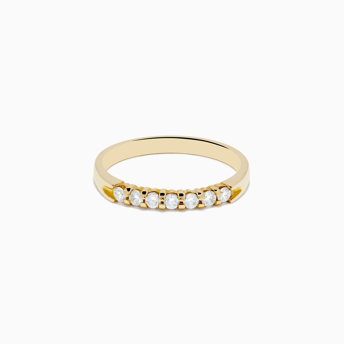 The 14K Yellow Gold 7-Stone Prong Set Diamond Band, 0.25 TCW, showcases a classic row of round white diamonds on a plain white background.
