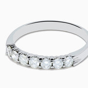 The 14K White Gold 7-Stone Prong Set Diamond Band, 0.50 TCW, features seven round white diamonds set across the top in polished white gold, shown against a plain white background.