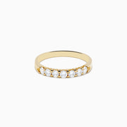 The 14K Yellow Gold 7-Stone Prong Set Diamond Band, 0.50 TCW, features a row of seven round white diamonds prong set across the top and is shown against a plain white background.