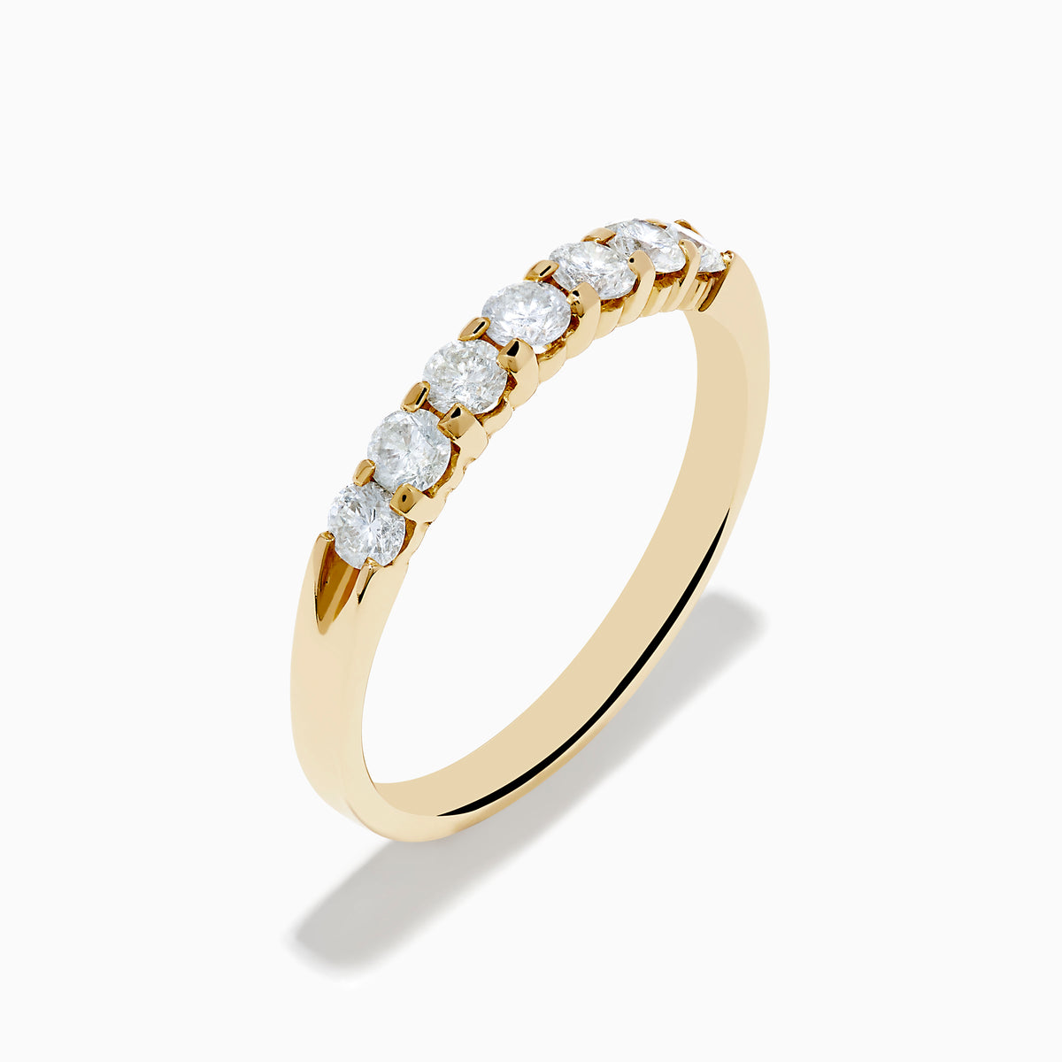 The 14K Yellow Gold 7-Stone Prong Set Diamond Band, 0.50 TCW, features a row of seven round white diamonds prong set across the top and is shown against a plain white background.