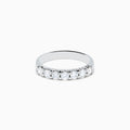 The 14K White Gold 7-Stone Prong Set Diamond Band, 0.75 TCW, showcases seven round diamonds set in a row along the band, displayed on a plain white background.
