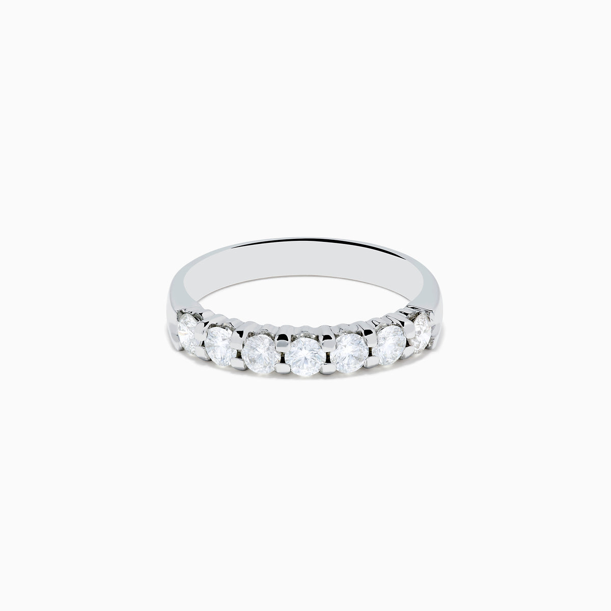 The 14K White Gold 7-Stone Prong Set Diamond Band, 0.75 TCW, showcases seven round diamonds set in a row along the band, displayed on a plain white background.