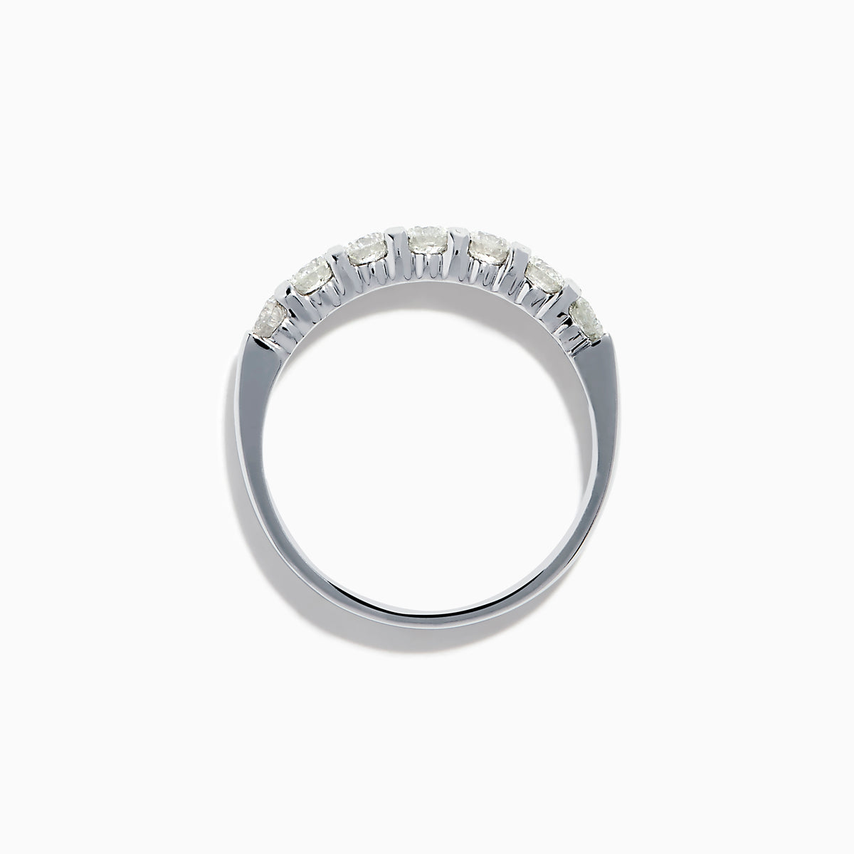 The 14K White Gold 7-Stone Prong Set Diamond Band, 0.75 TCW, showcases seven round diamonds set in a row along the band, displayed on a plain white background.