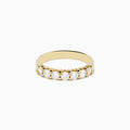 The 14K Yellow Gold 7-Stone Prong Set Diamond Band, 0.75 TCW, showcases a row of seven round diamonds set in yellow gold and displayed against a plain white background.
